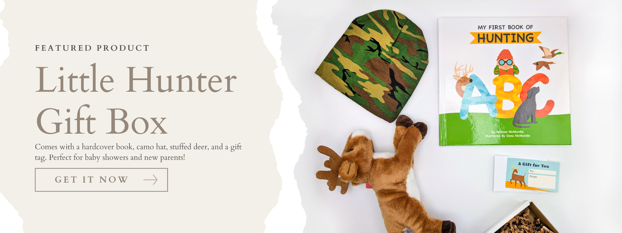 Little Hunter Gift Box with camouflage hat, plush deer, and children's book on a white background